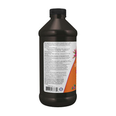 NOW Foods botella junto a una cucharada medidora para dosificación precisa