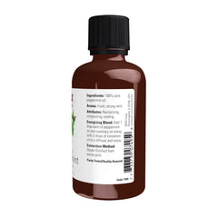 NOW Foods gota cercana del aceite de menta en vidrio que muestra pureza y textura