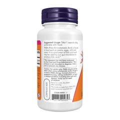 NOW Foods cápsula de PABA 500 mg en primer plano mostrando textura y tamaño