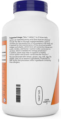 NOW Foods primer plano de una tableta L-Lysine detallando su textura comprimida y pureza