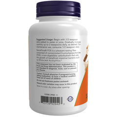 Cuchara con dosis de NutraFlora FOS destacando facilidad de medida