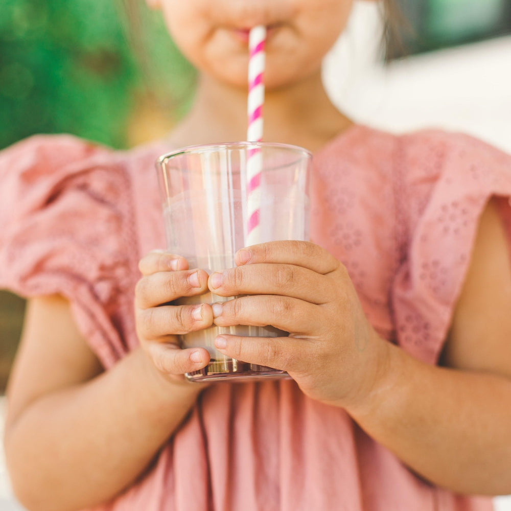 Detalle de la etiqueta Nurished con lista de vitaminas, probióticos y espinaca