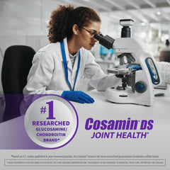 Comparación de tamaño Nutramax Cosamin DS junto a una moneda para referencia visual