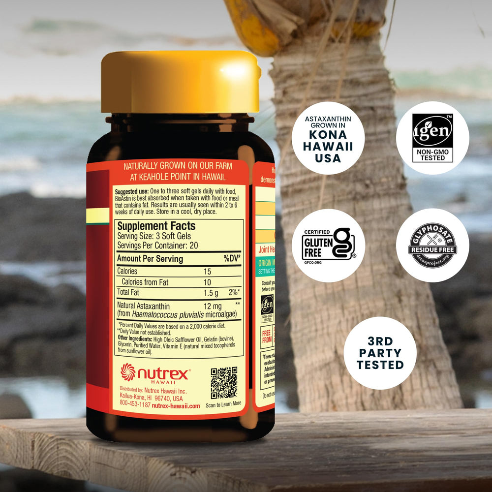 Nutrex Hawaii cápsula en mano mostrando tamaño fácil de tragar