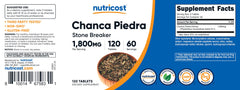 Nutricost frasco sobre mesa con elementos saludables para contexto diario