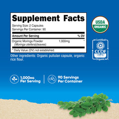Nutricost moringa cápsulas abiertas con polvo visible, demuestra pureza y origen vegetal