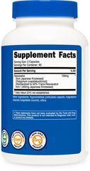 Comparación de tamaño Nutricost Resveratrol junto a moneda para referencia de escala