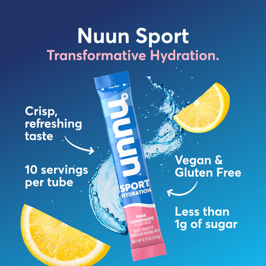 Polvo rosa de Nuun en primer plano, textura fina que facilita disolución