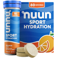 Nuun tubo frontal naranja mostrando envase portátil y conveniencia
