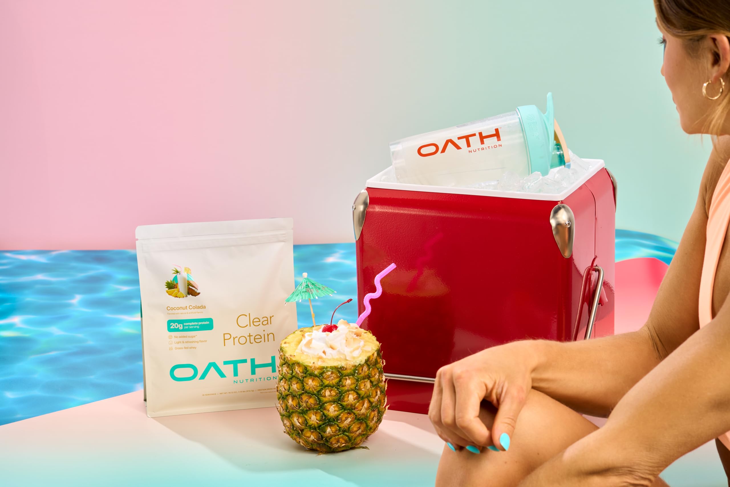Oath Nutrition estilo de vida: bote junto a toalla en playa, práctico y refrescante