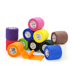 OK TAPE empaque frontal mostrando los 12 rollos y variedad de colores, ideal para botiquín