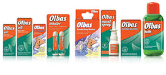 Olbas en mesita de noche sobre almohada mostrando alivio nocturno
