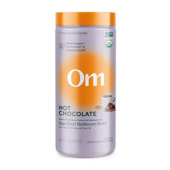 OM MUSHROOM SUPERFOOD bote frontal mostrando etiqueta y beneficio energizante
