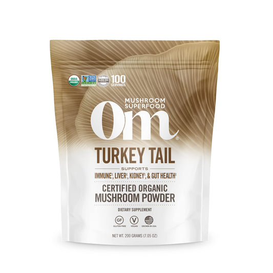 OM MUSHROOM SUPERFOOD envase frontal de Turkey Tail que muestra presentación y beneficio