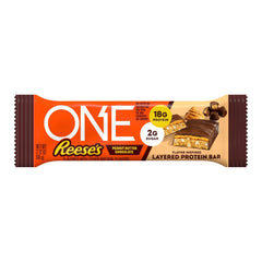 ONE REESE'S comparación de tamaño junto a una mano para referencia práctica