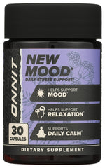 ONNIT New MOOD cápsula en mano para visual de dosis y facilidad