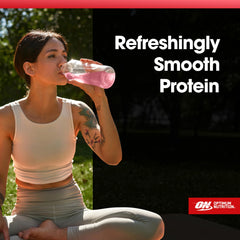 Optimum Nutrition envase junto a una mano, comparación de tamaño y porciones