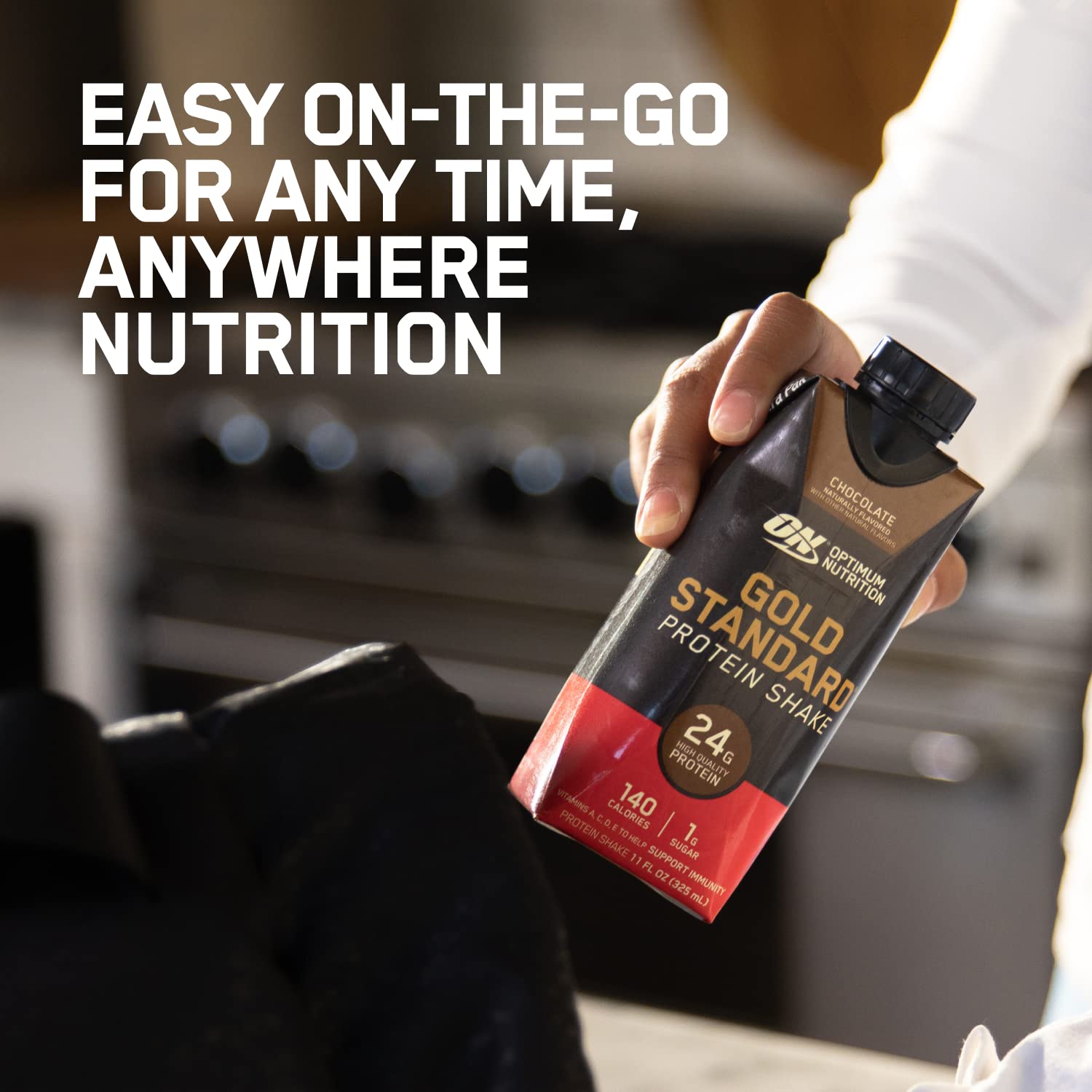 Optimum Nutrition comparación de tamaño con una botella de agua para entender escala