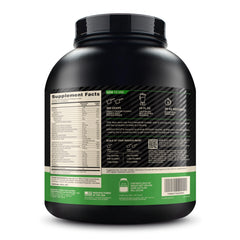 Optimum Nutrition shaker en gimnasio con producto, uso práctico post-entreno