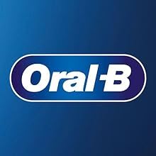 Comparación de tamaño del cabezal Oral-B frente a una moneda muestra escala precisa