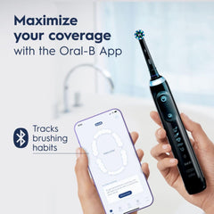 Oral-B Genius X en estuche de viaje que carga cepillo y smartphone