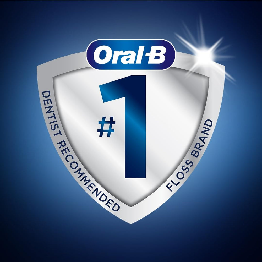 Oral-B floss picks en un baño moderno mostrando uso cotidiano y frescura inmediata