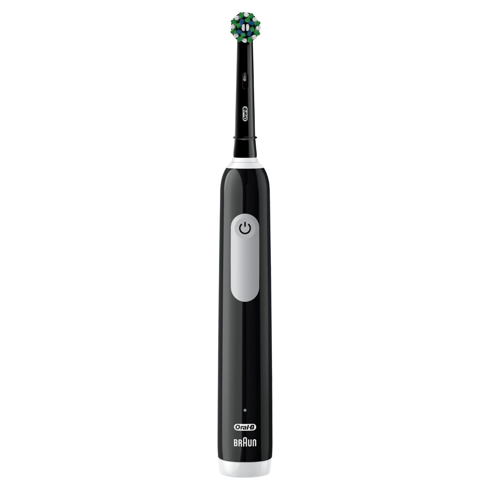 Oral-B Pro 1000 en mano durante el cepillado para fácil manejo