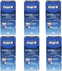 Oral-B vista frontal del paquete con hebras pre-cortadas y beneficio de higiene rápida