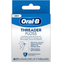 Oral-B paquete frontal mostrando 30 enhebradores, práctico y portátil