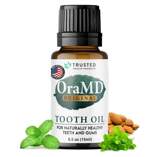 OraMD botella frontal mostrando el envase y beneficio de limpieza natural
