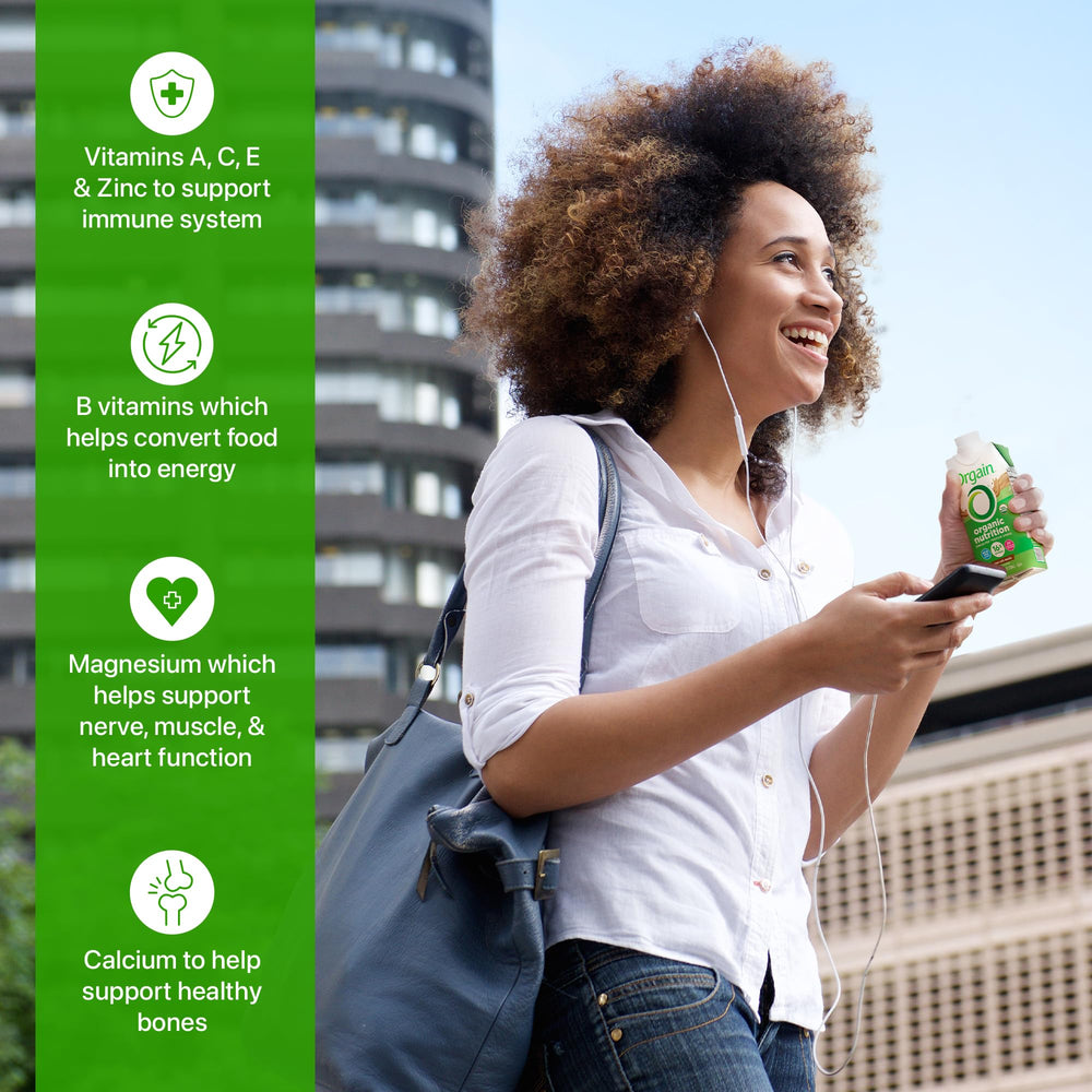 Orgain batido en mano para comparar tamaño y facilidad de transporte