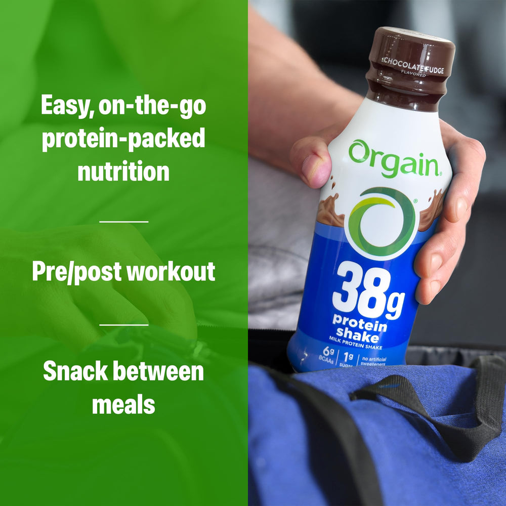 Orgain persona sosteniendo el shake, portátil y conveniente para el día