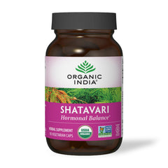 ORGANIC INDIA frasco sobre encimera en ambiente cotidiano para integración diaria