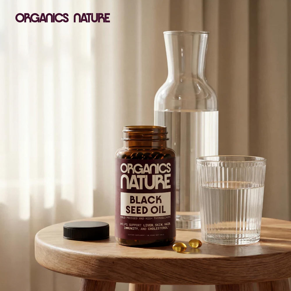 ORGANICS NATURE cápsula junto a monedas para comparar tamaño real