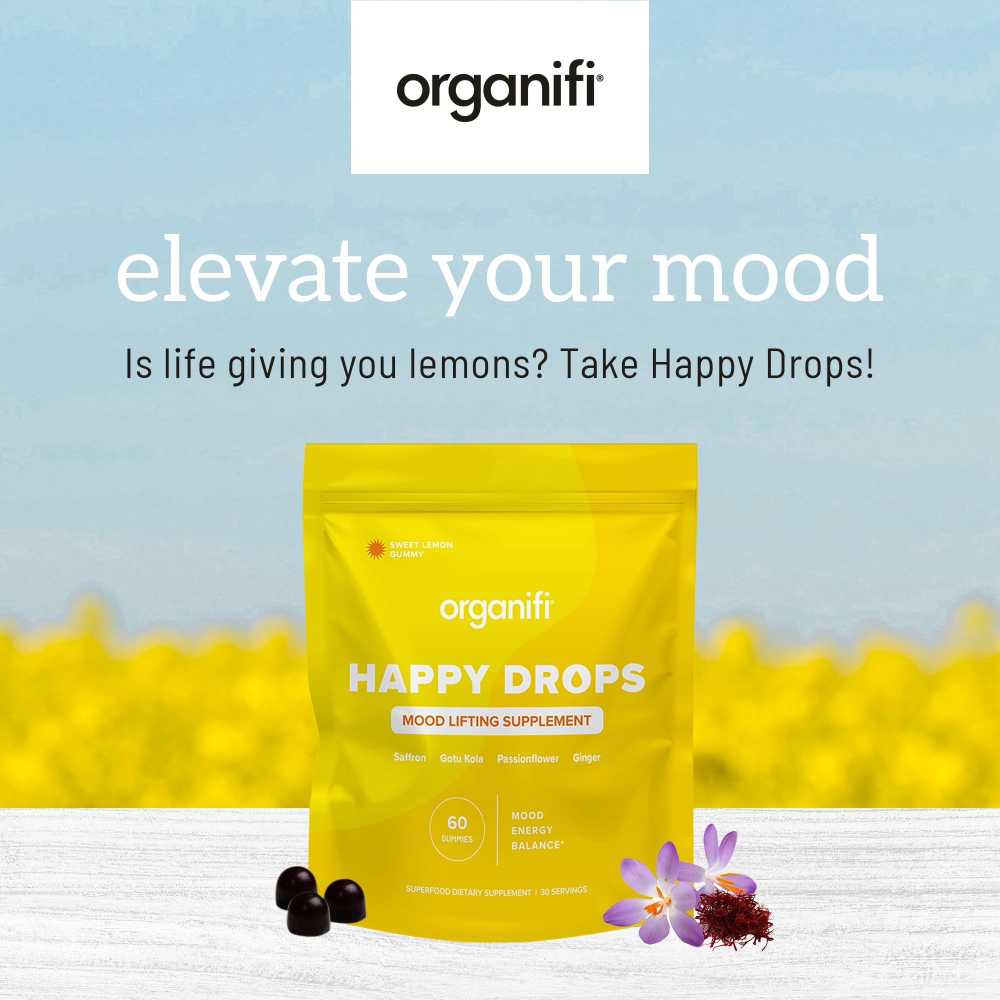 Organifi Happy Drops ingredientes naturales en mesa mostrando transparencia