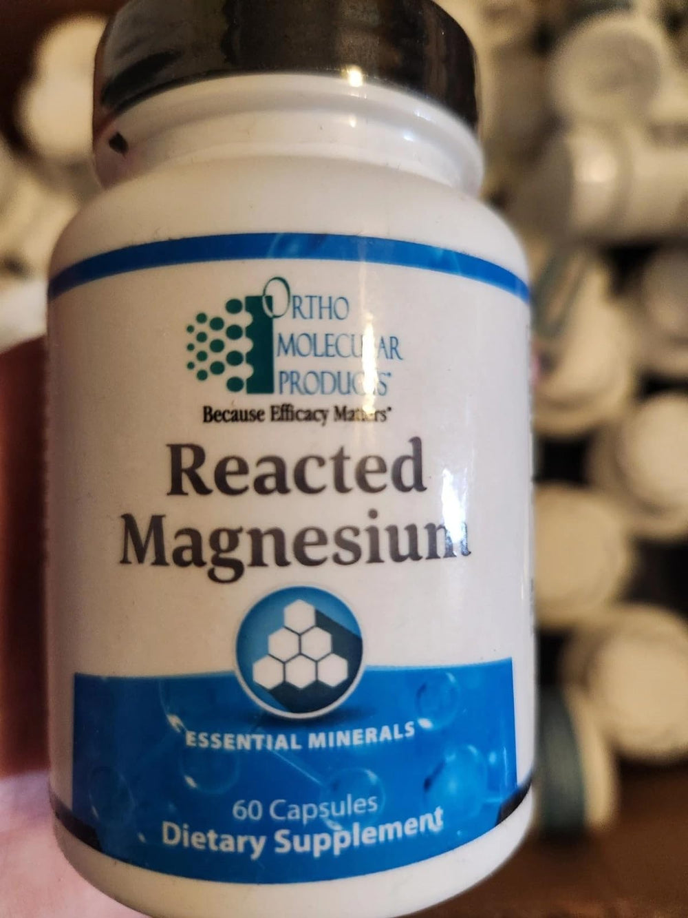 Ortho Molecular Reacted Magnesium envase frontal 60 cápsulas mostrando información clara y conveniencia