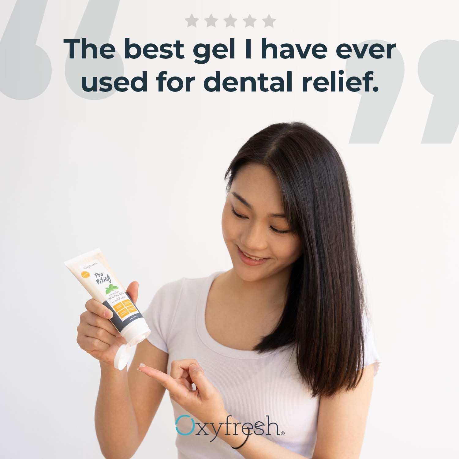Oxyfresh aplicación en encía con mano aplicadora mostrando alivio localizado