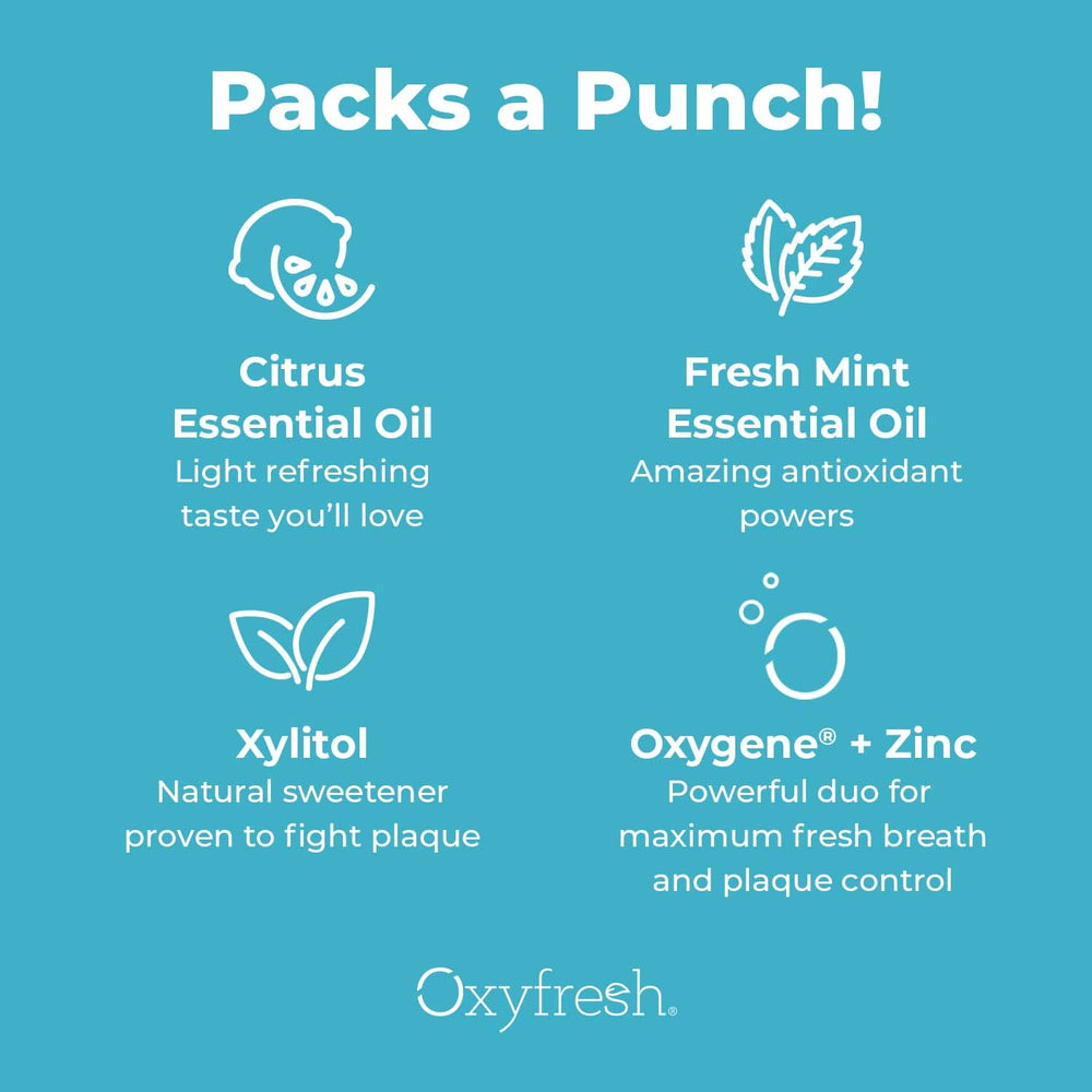 Oxyfresh mano aplicando pasta al cepillo demostrando fácil dispensado
