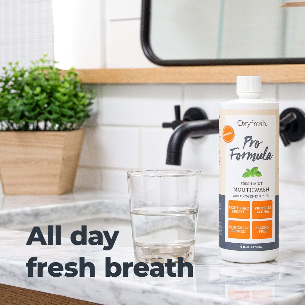 Oxyfresh botella junto a una regla para comparar tamaño y conveniencia