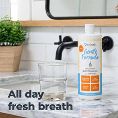 Oxyfresh botella en mano para mostrar escala y tamaño práctico