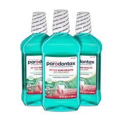 Parodontax pack de tres botellas mostrando el frente y la marca, beneficio: encías saludables