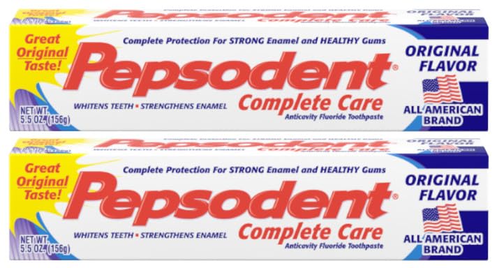 Pepsodent pack frontal mostrando los dos tubos y beneficio de protección anticaries
