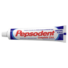 Pepsodent pasta textura en primer plano, revela aspecto cremoso y fácil aplicación