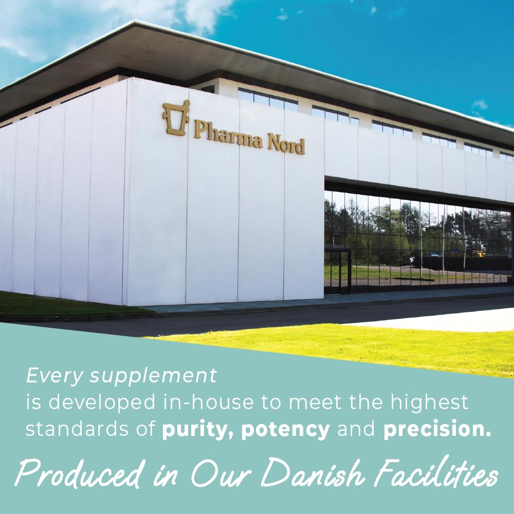 Pharma Nord softgel junto a un vaso de agua en uso cotidiano y práctica