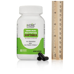 Pharmvista TheHeme softgel junto a plato indicando toma con comidas