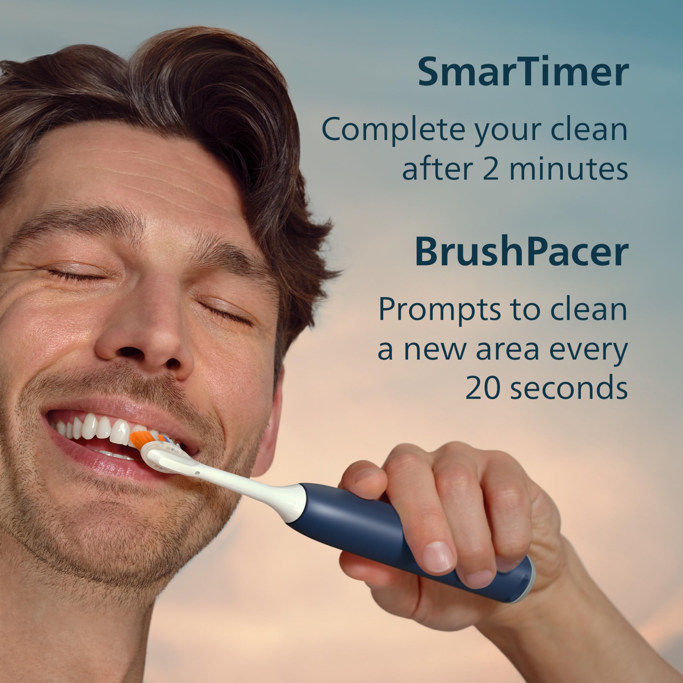 Philips Sonicare comparación de tamaño frente a un cepillo manual para escala