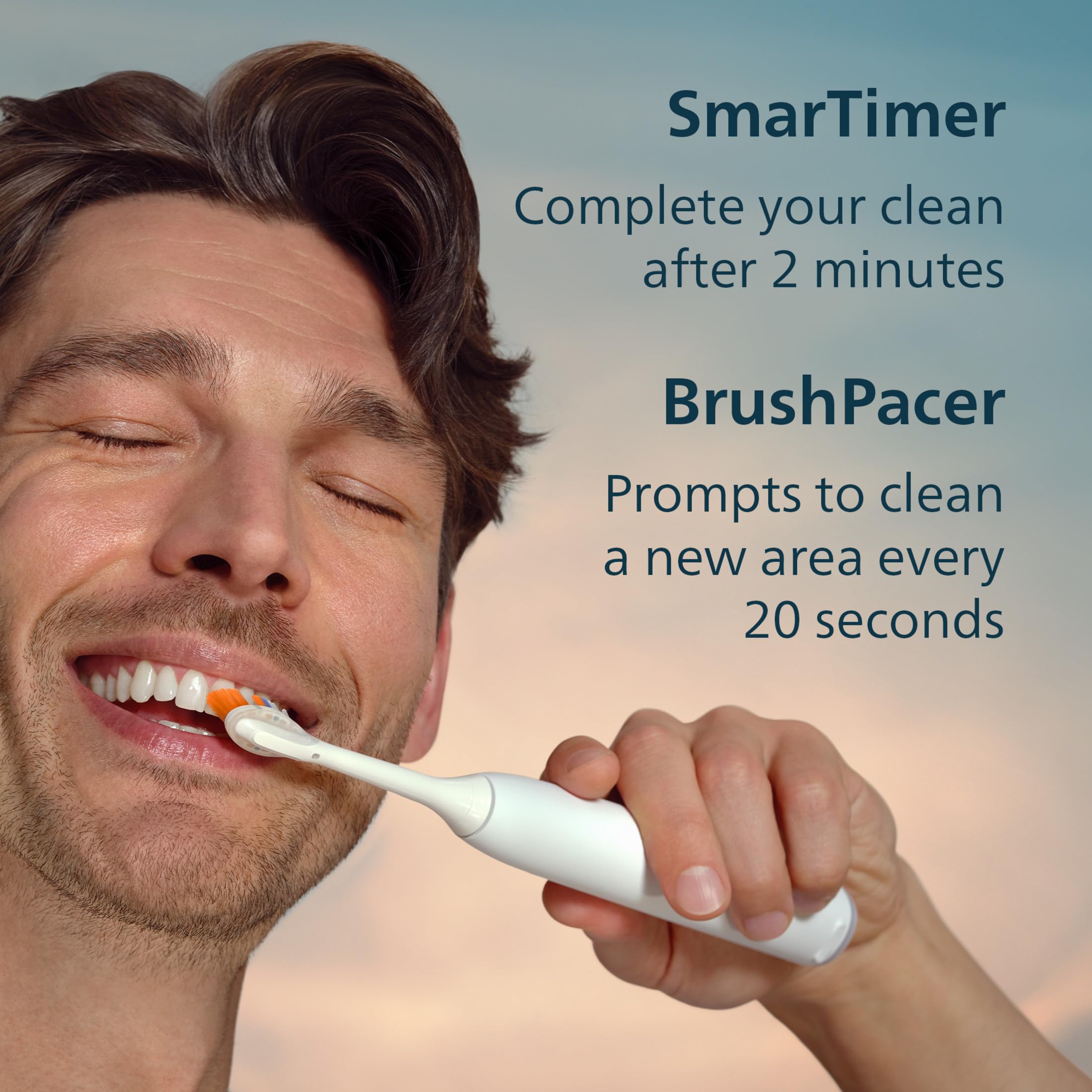 Philips Sonicare 7300 comparación de tamaño con un cepillo manual para escala visual
