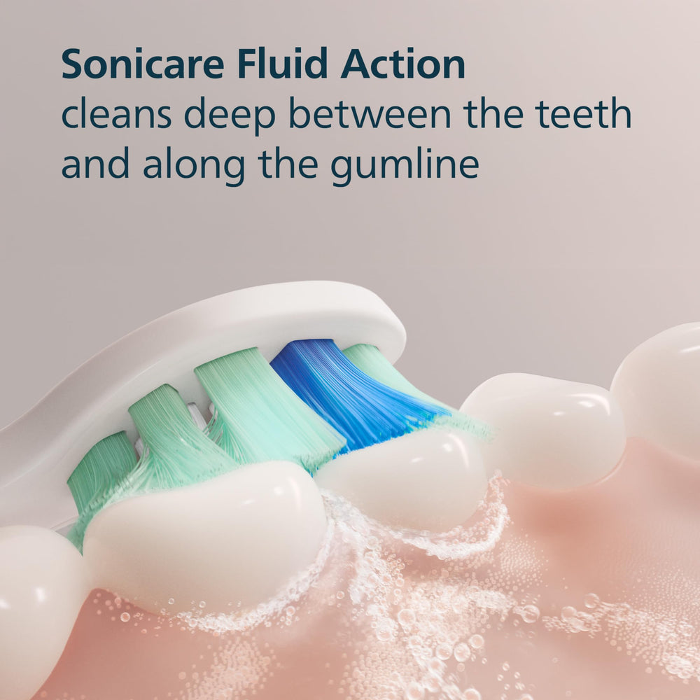 Philips Sonicare comparación de tamaño junto a moneda, escala real y proporción