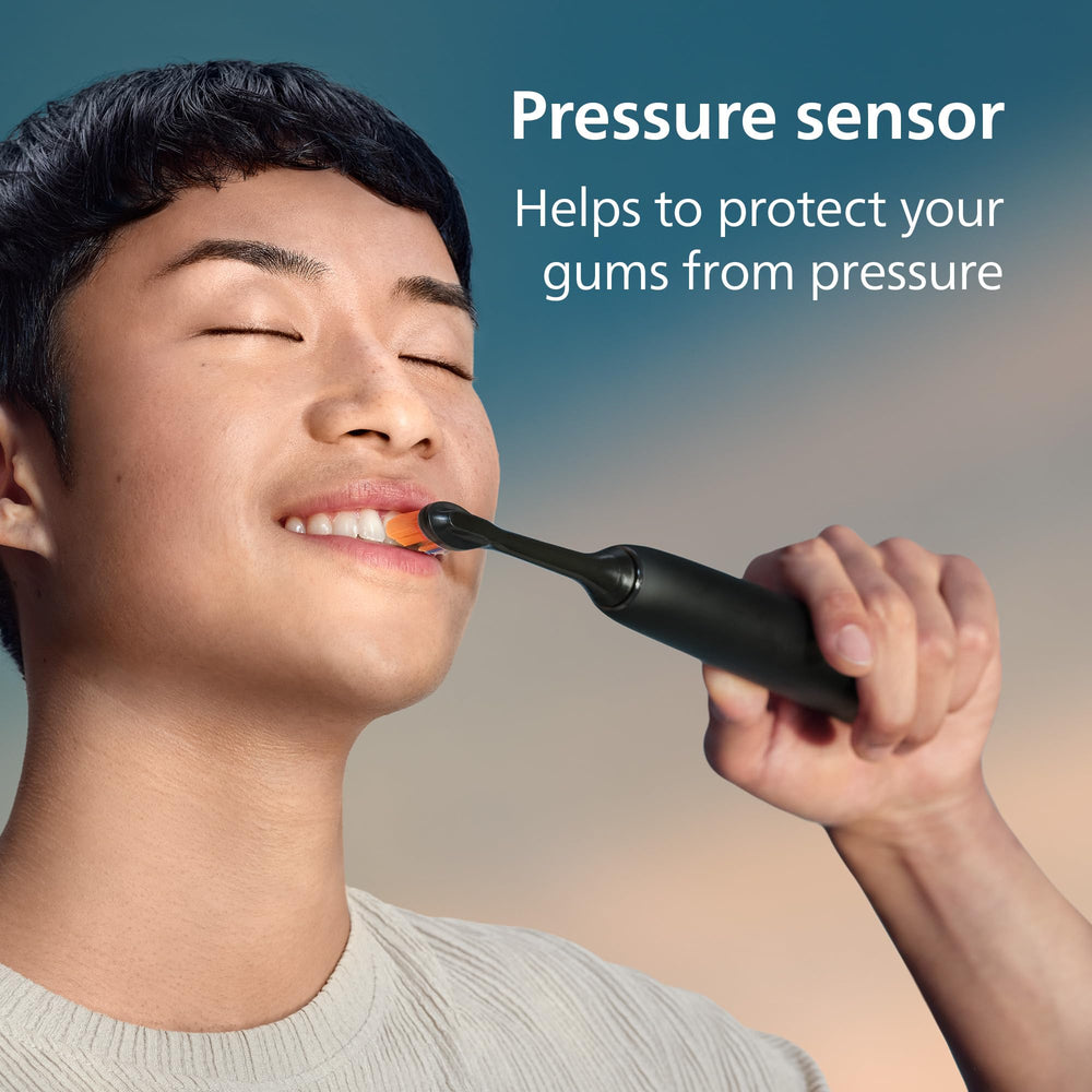 Philips Sonicare cepillo en uso sobre dientes, demuestra limpieza profunda y cómoda