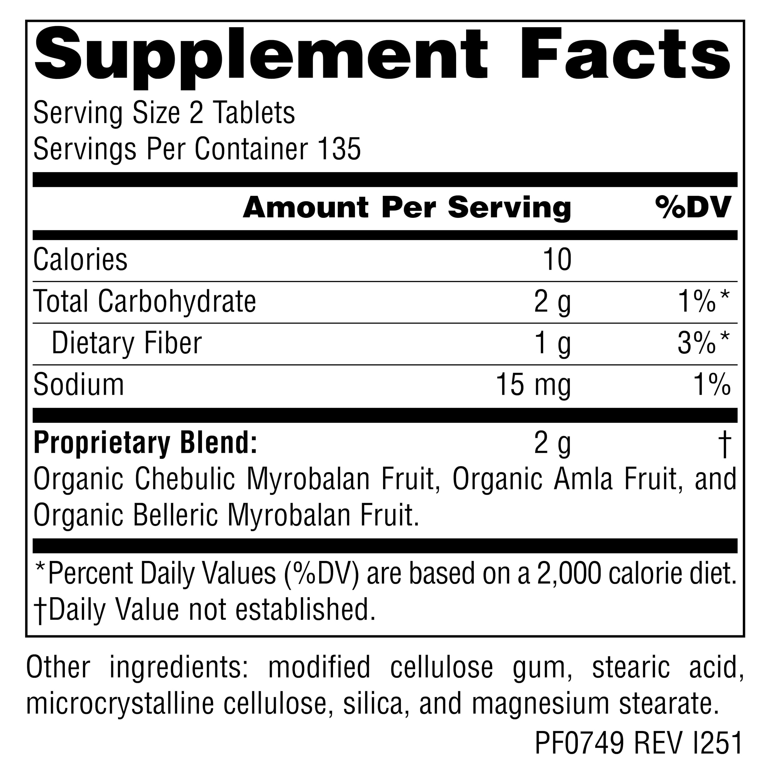 Primer plano de una tableta Triphala Planetary Herbals para dosificación clara